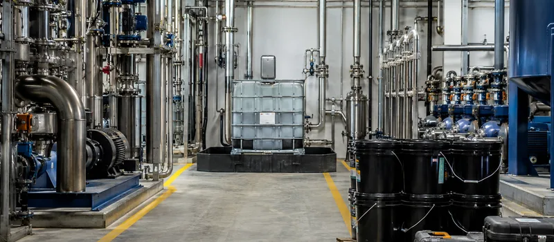 Process equipment and sealed supplies in an industrial facility.