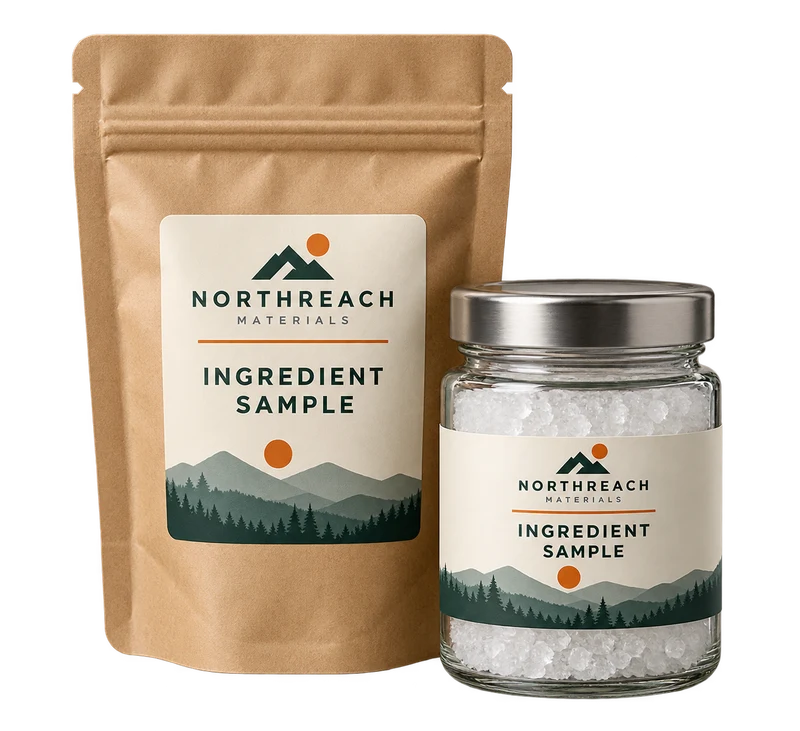 One small sealed kraft ingredient bag and a closed clear jar of white crystals, with fictional NORTHREACH MATERIALS branding.
